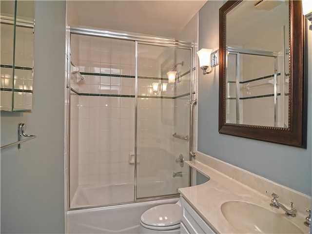 13 Palm Road Sewall's Point, FL 34996 - Photo 22 of 25 a bathroom with a granite countertop sink toilet and shower
