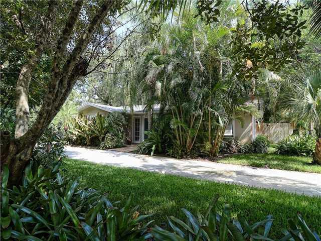 13 Palm Road Sewall's Point, FL 34996 - Photo 3 of 25 a view of swimming pool with a tree