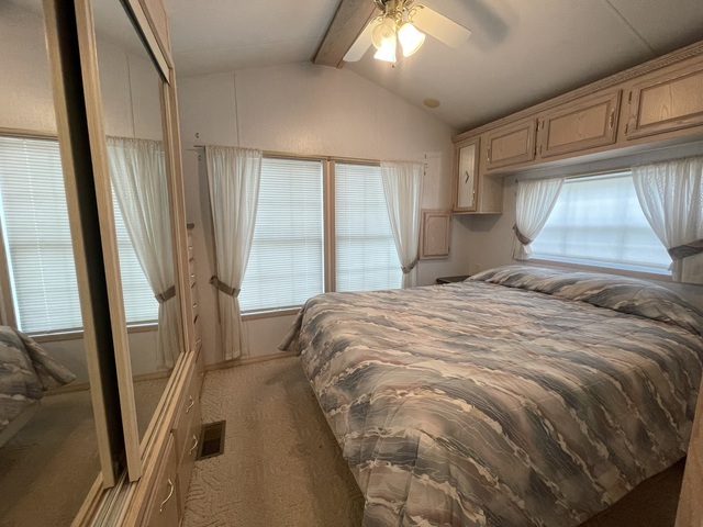 4-52 Woodhaven Lakes Sublette, IL 61367 - Photo 17 of 35 a bedroom with a bed and a window