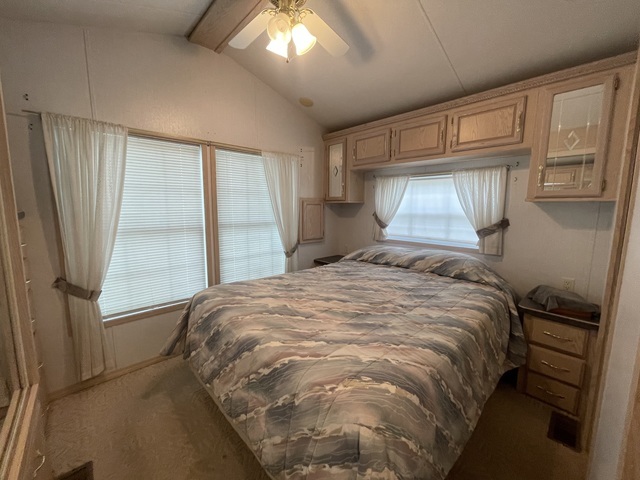4-52 Woodhaven Lakes Sublette, IL 61367 - Photo 18 of 35 a bedroom with a bed and a window