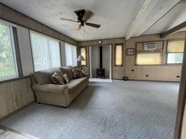 4-52 Woodhaven Lakes Sublette, IL 61367 - Photo 21 of 35 a living room with furniture and a large window