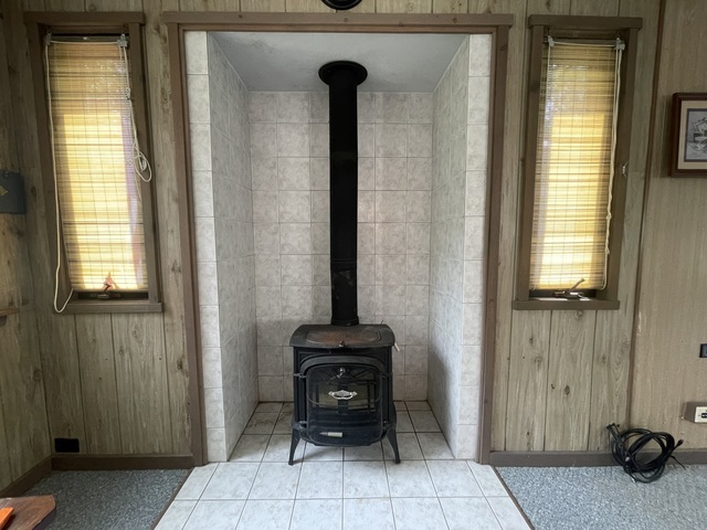 4-52 Woodhaven Lakes Sublette, IL 61367 - Photo 22 of 35 a room that has a bed and a chair in it