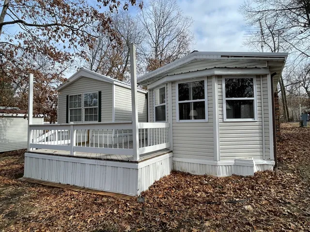 a front view of a house with balcony
