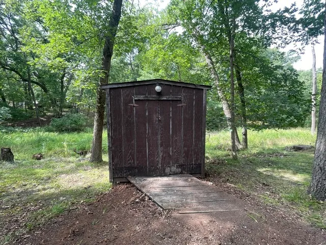 a view of backyard with green space
