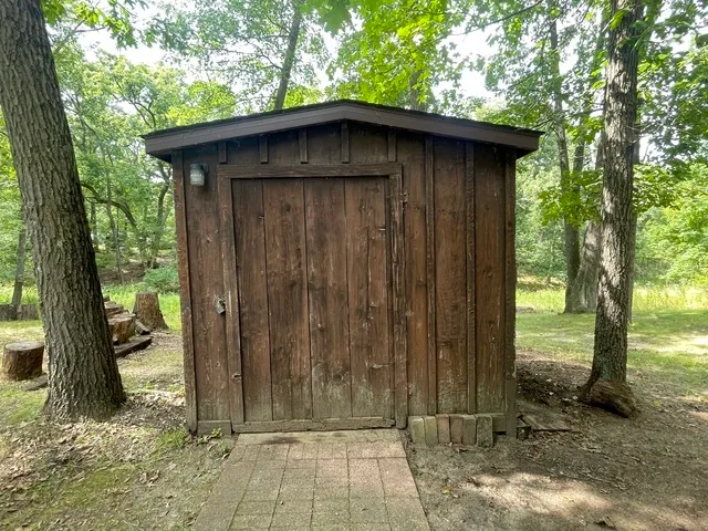 a wooden door in front of a house