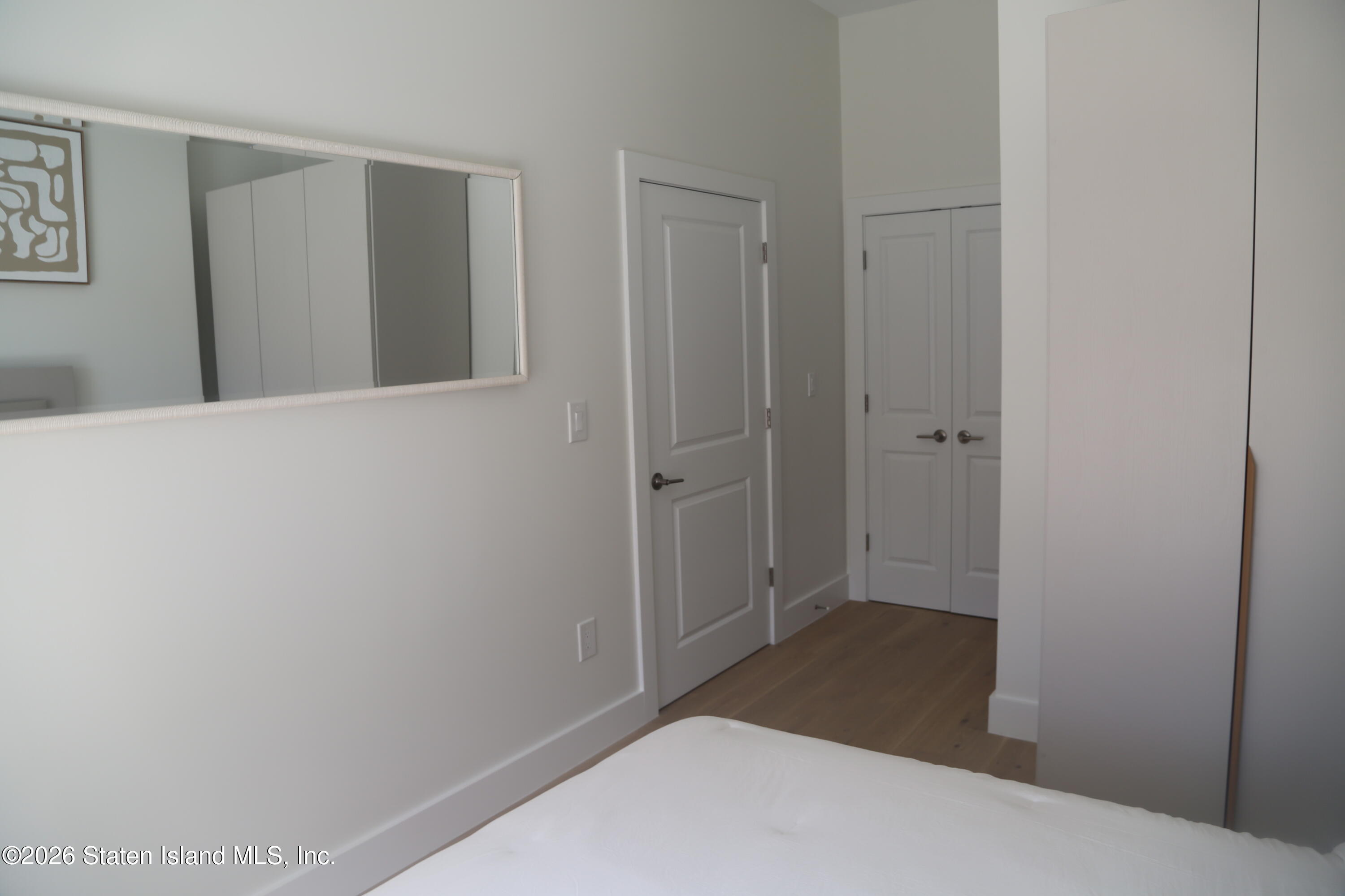 1239 Forest Hill Road, Unit 24 Staten Island, NY 10314 - Photo 7 of 8 a view of a hallway