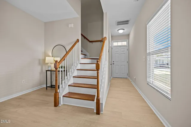 a view of an entryway with staircase