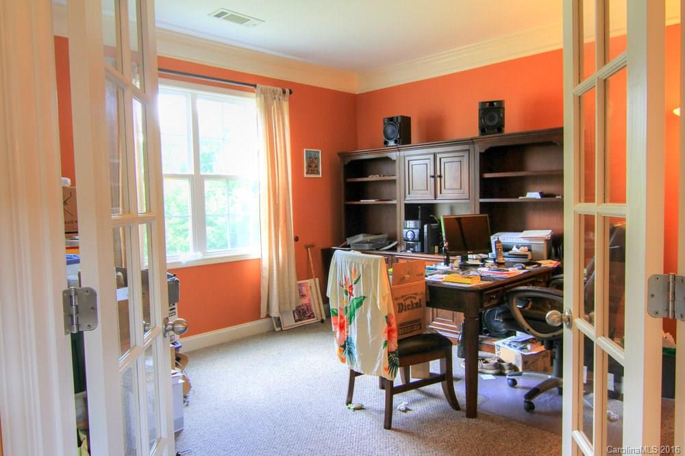 6007 Sedgewick Road Indian Trail, NC 28079 - Photo 22 of 24 a view of a workspace with furniture and a window