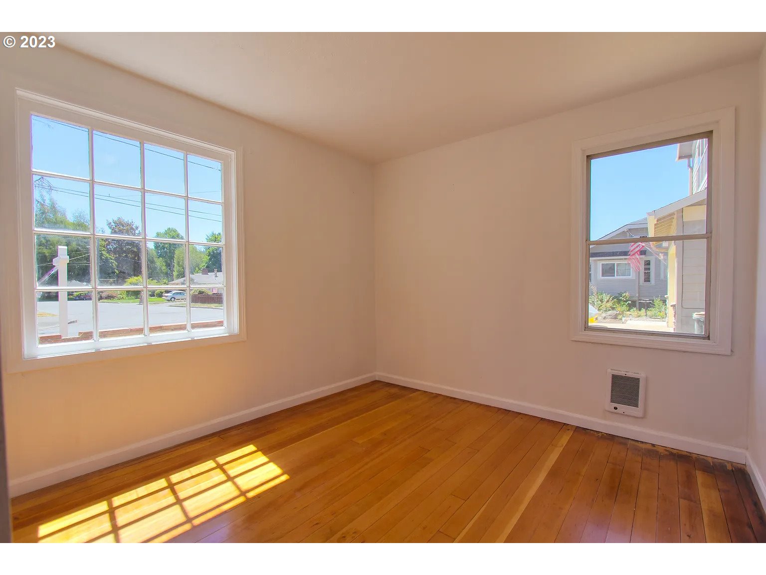 711 Southeast 5th Street Gresham, OR 97080 - Photo 10 of 25 a view of an empty room with a window