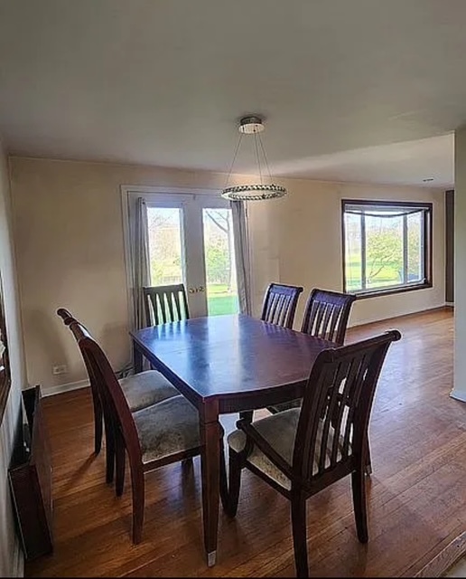 37 Choate Road Park Forest, IL 60466 - Photo 6 of 17 a view of a dining room with furniture and wooden floor