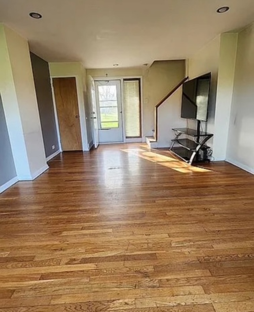 37 Choate Road Park Forest, IL 60466 - Photo 10 of 17 a view of room with window and wooden floor