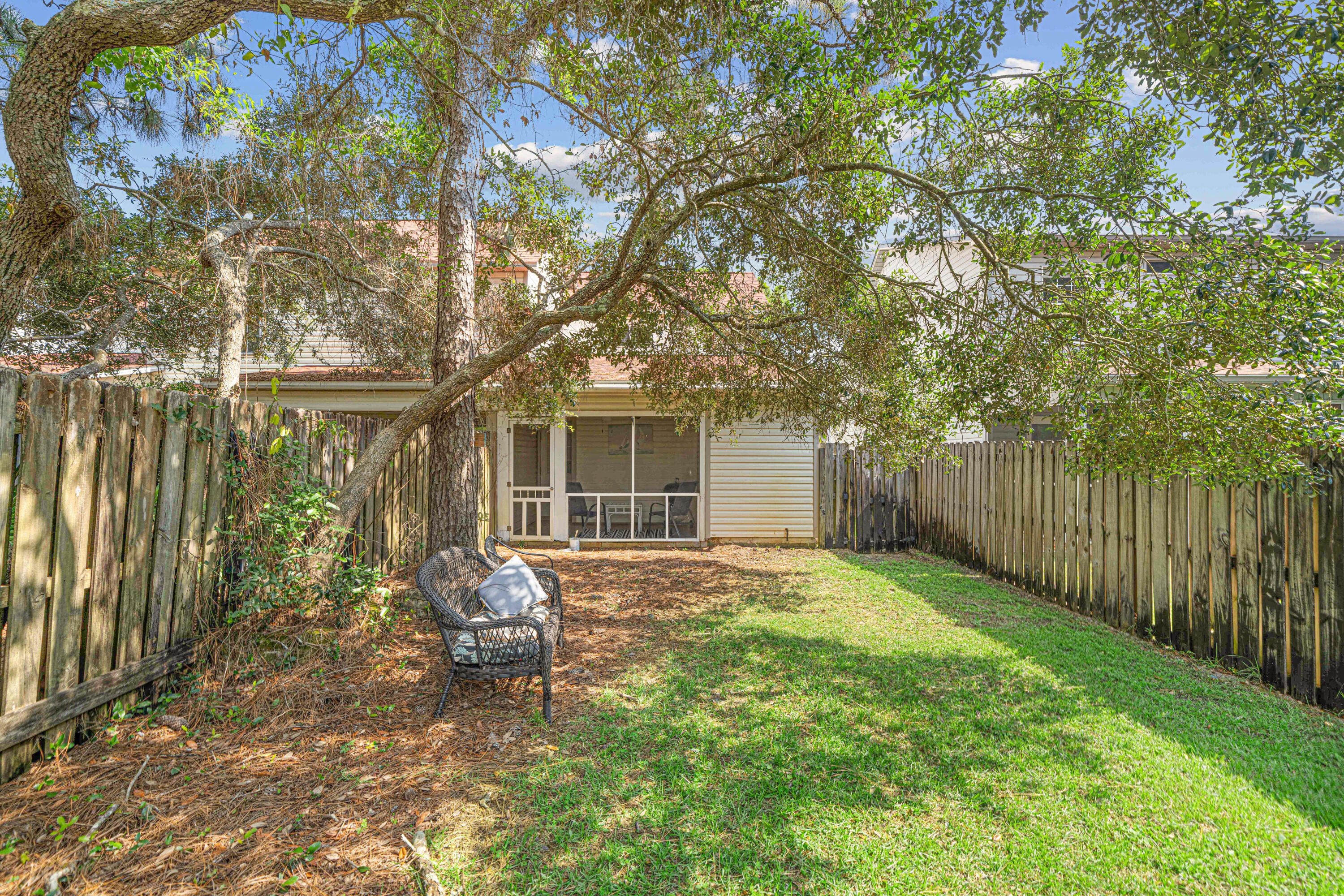 42 Vía Largo, Unit 7B Santa Rosa Beach, FL 32459 - Photo 14 of 36 a house with garden in front of it
