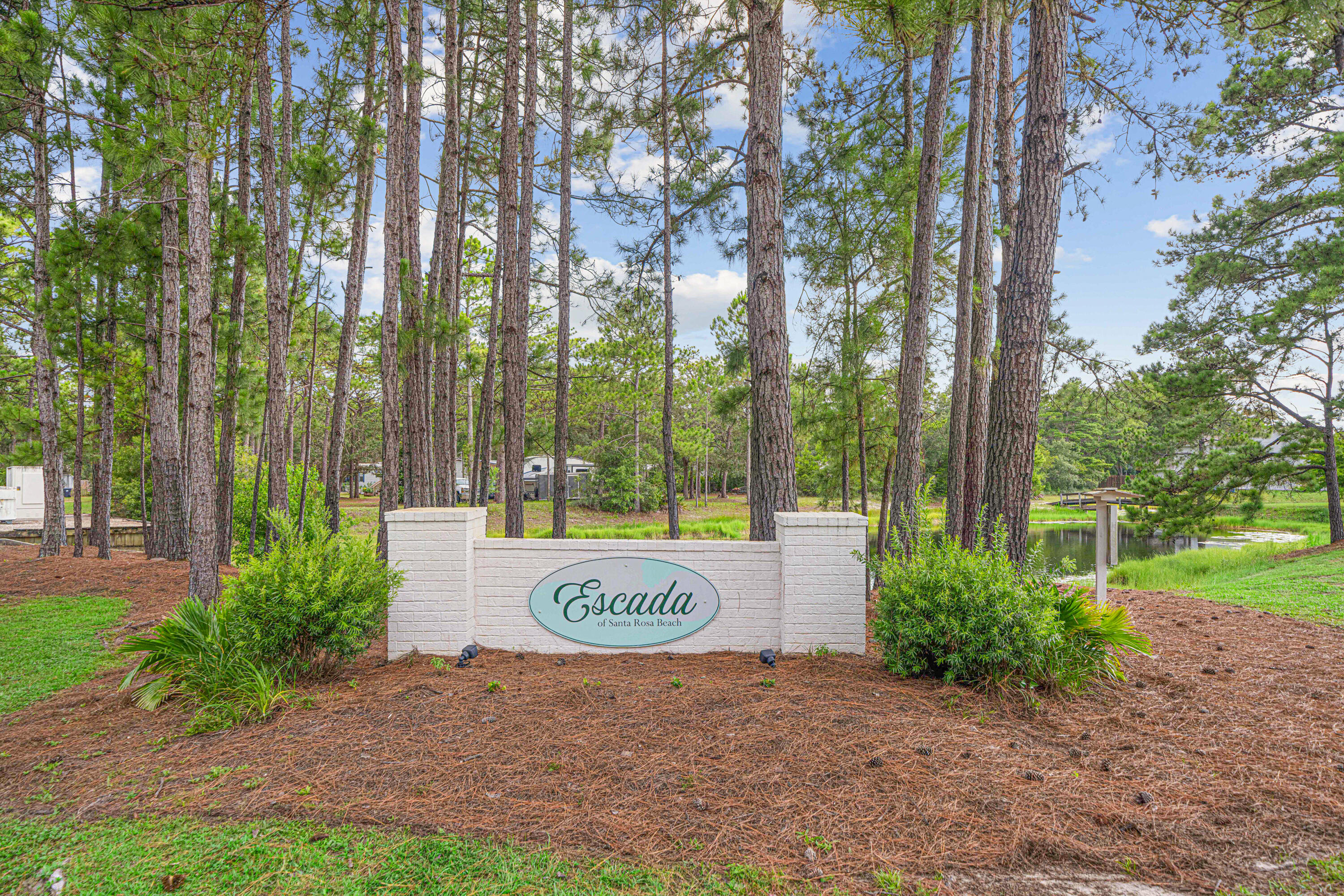 42 Vía Largo, Unit 7B Santa Rosa Beach, FL 32459 - Photo 25 of 36 a view of a outdoor space and trees