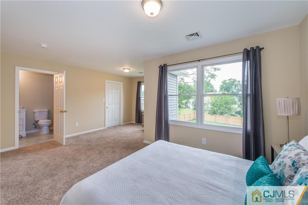 60 Morgan Drive Edison, NJ 08817 - Photo 11 of 20 a view of livingroom with furniture and window