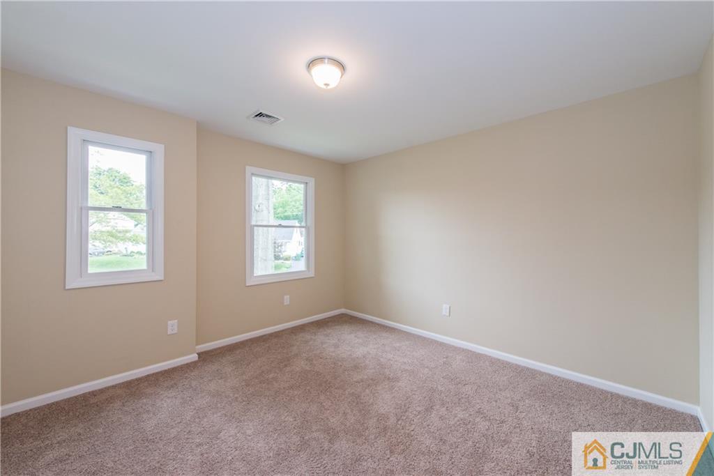 60 Morgan Drive Edison, NJ 08817 - Photo 14 of 20 an empty room with windows