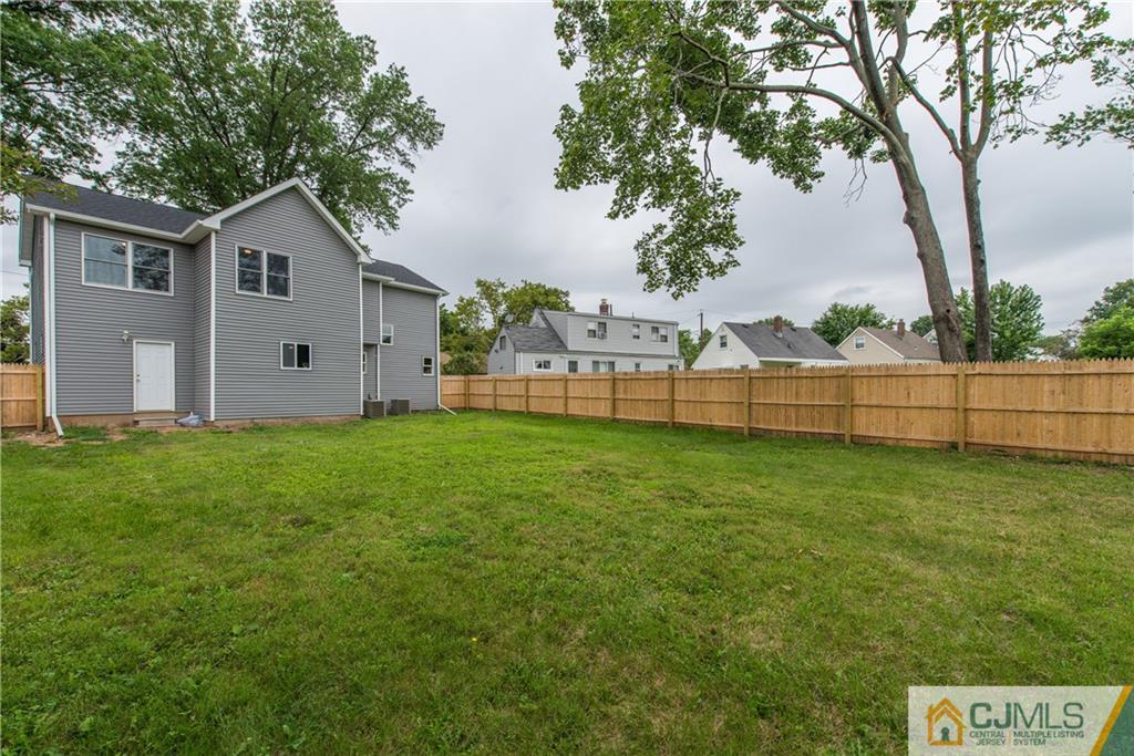 60 Morgan Drive Edison, NJ 08817 - Photo 20 of 20 a view of backyard with garden and trees
