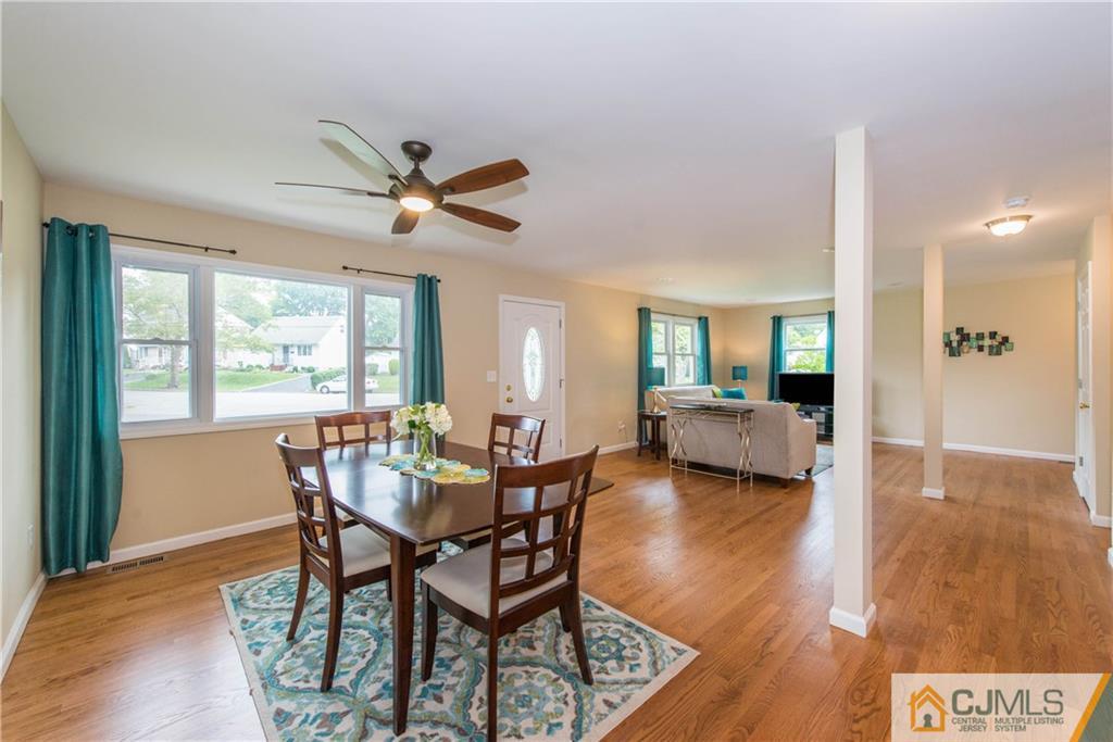 60 Morgan Drive Edison, NJ 08817 - Photo 3 of 20 a view of a dining room with furniture window and wooden floor