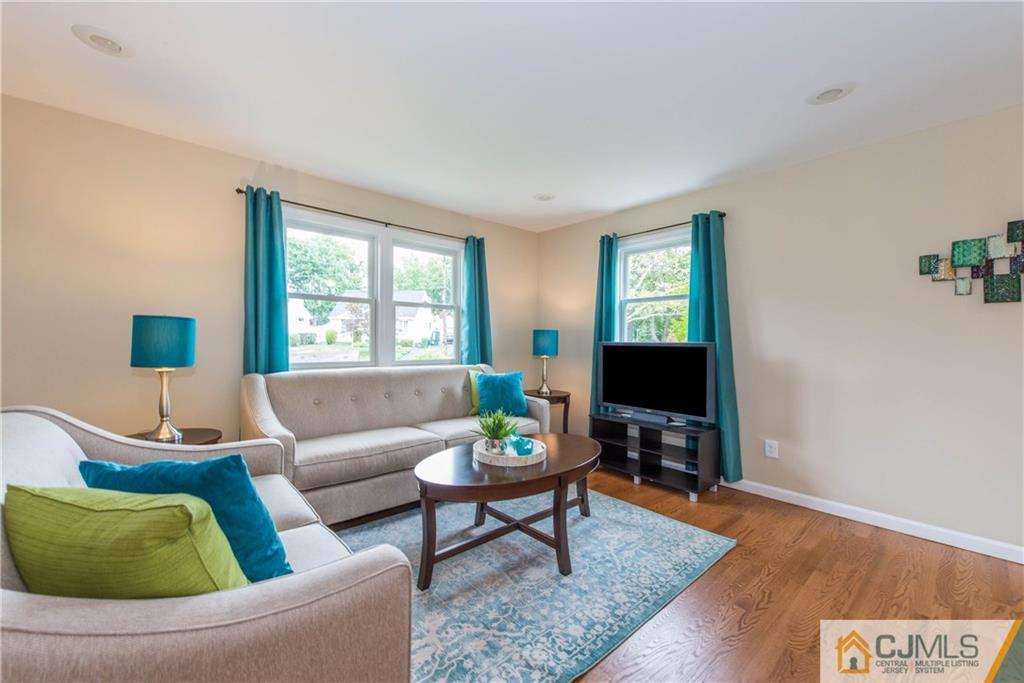 60 Morgan Drive Edison, NJ 08817 - Photo 5 of 20 a living room with furniture and a window