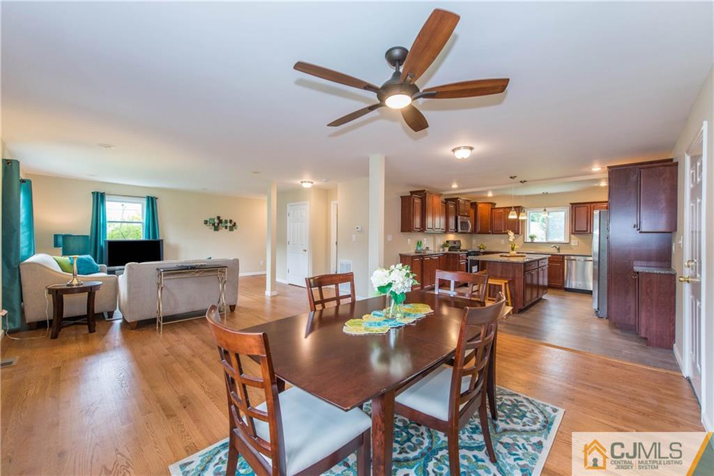 60 Morgan Drive Edison, NJ 08817 - Photo 6 of 20 a living room with furniture and kitchen view