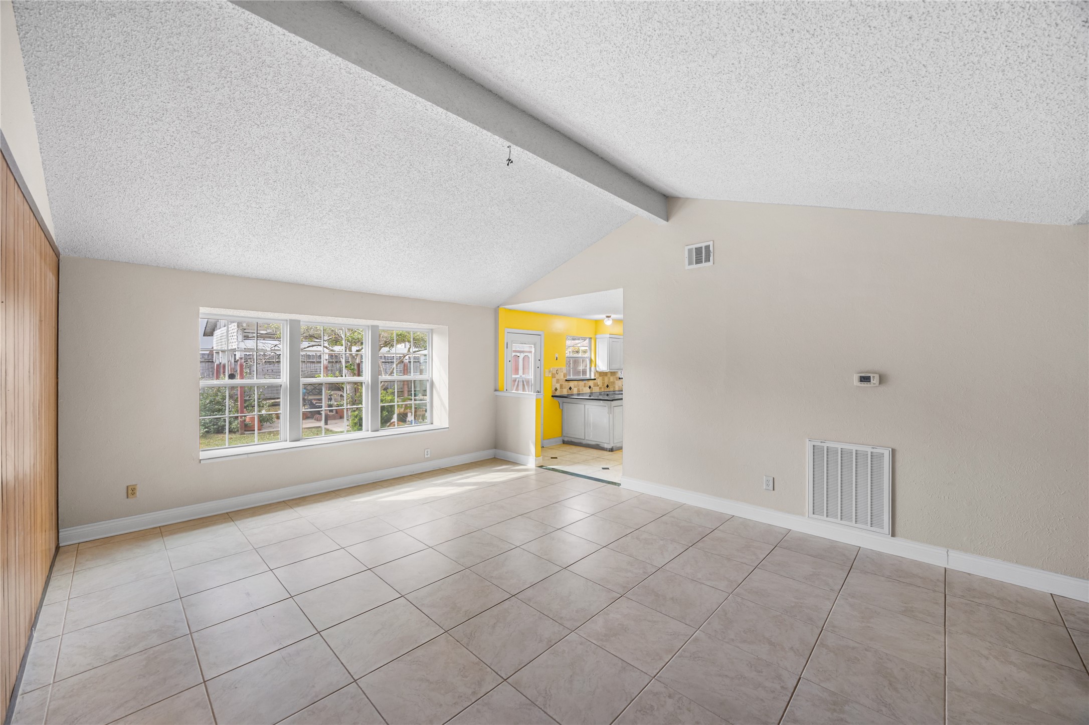 7211 Sandswept Lane Houston, TX 77086 - Photo 15 of 29 a view of an empty room with a window