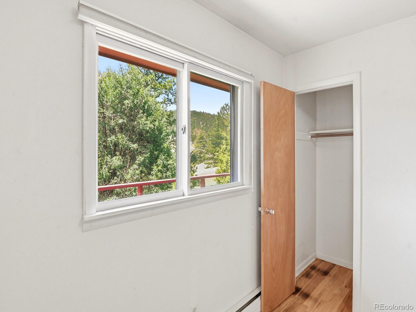 2830 Kerr Gulch Road Evergreen, CO 80439 - Photo 28 of 48 a view of a window in a room