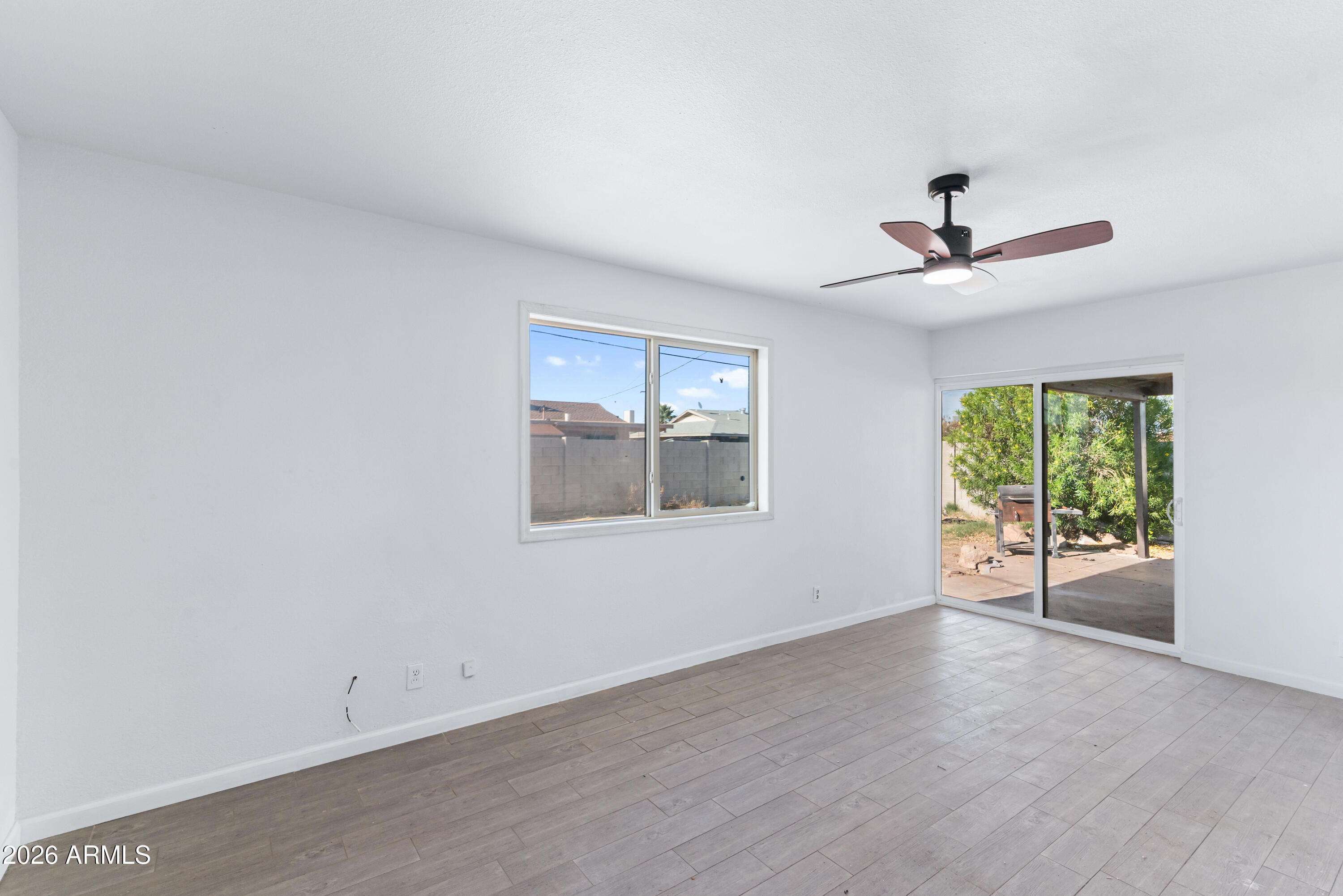 860 West McLellan Road Mesa, AZ 85201 - Photo 7 of 26 a view of an empty room with a window