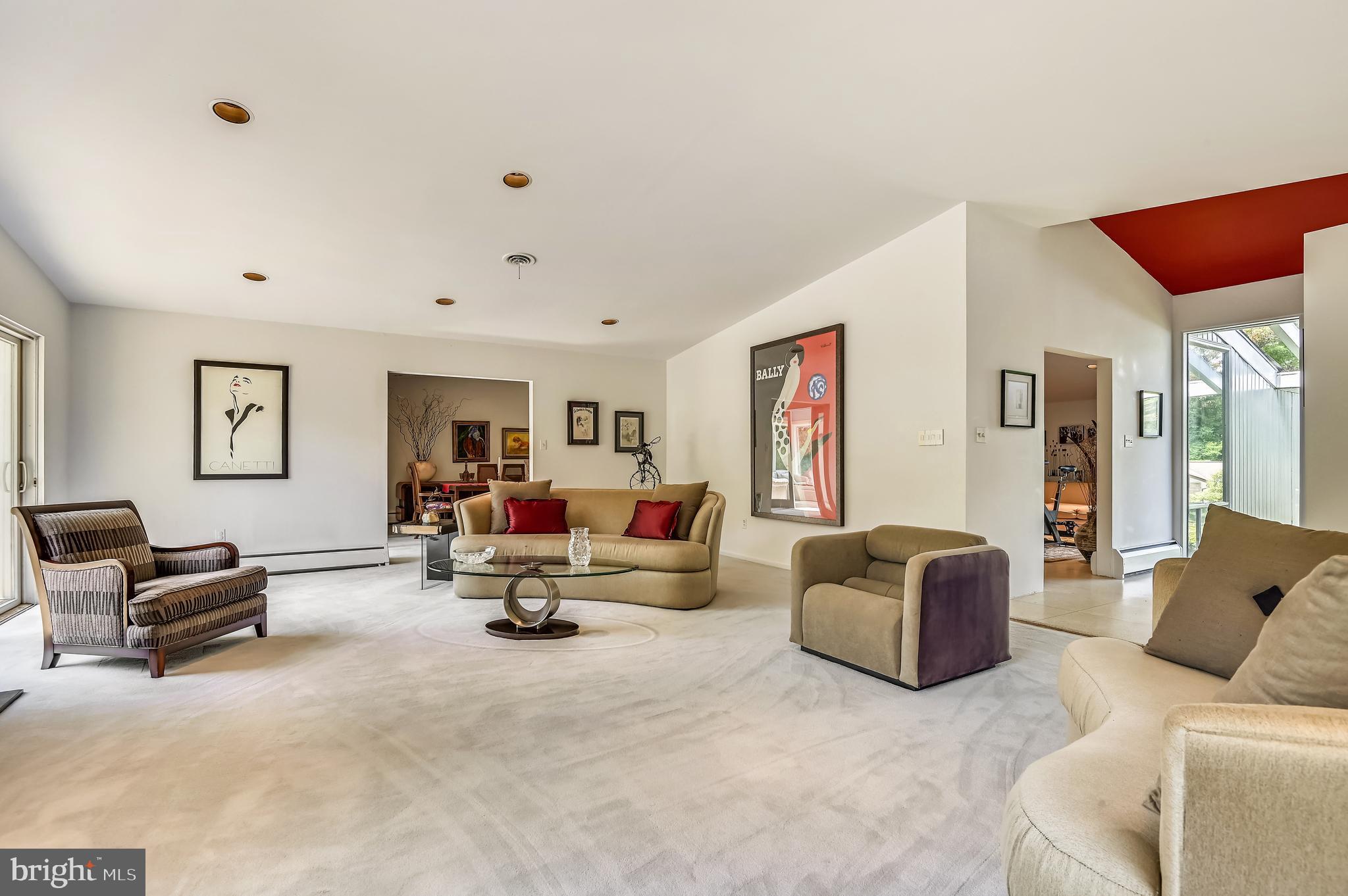 3413 Fielding Road Baltimore, MD 21208 - Photo 4 of 40 Spacious family room with fp and sliders to patio.