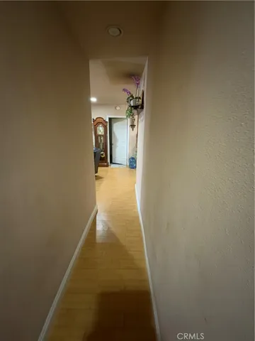 a view of a hallway to a house
