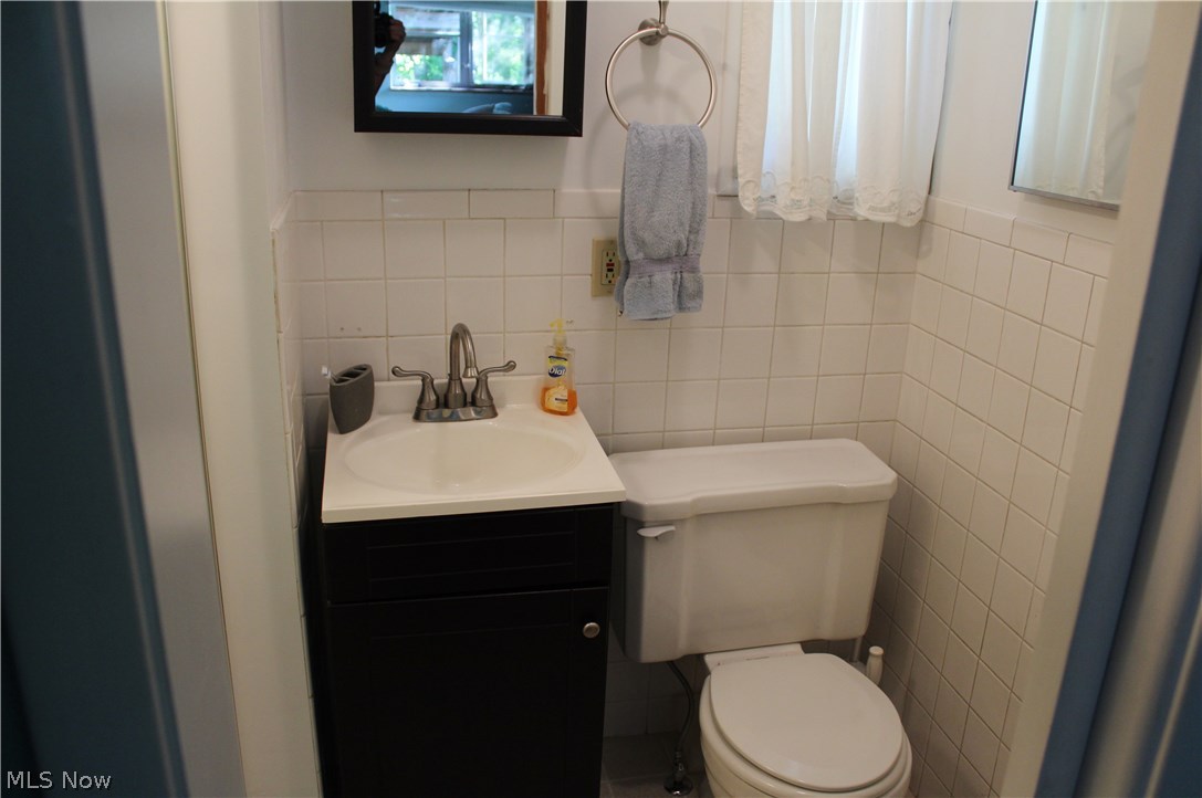 1825 Walnut Road Kent, OH 44240 - Photo 16 of 23 The onsuite master bath is small but functional with stand-up shower to the left of the photo.