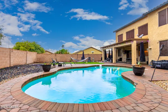 a view of a house with swimming pool