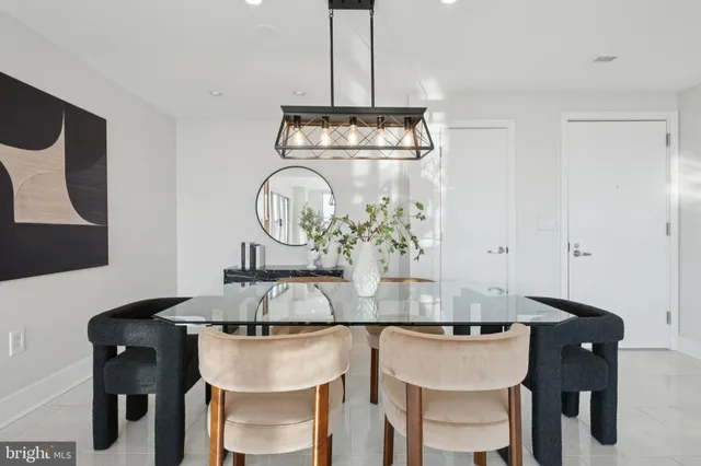 a kitchen with stainless steel appliances granite countertop a refrigerator sink and cabinets
