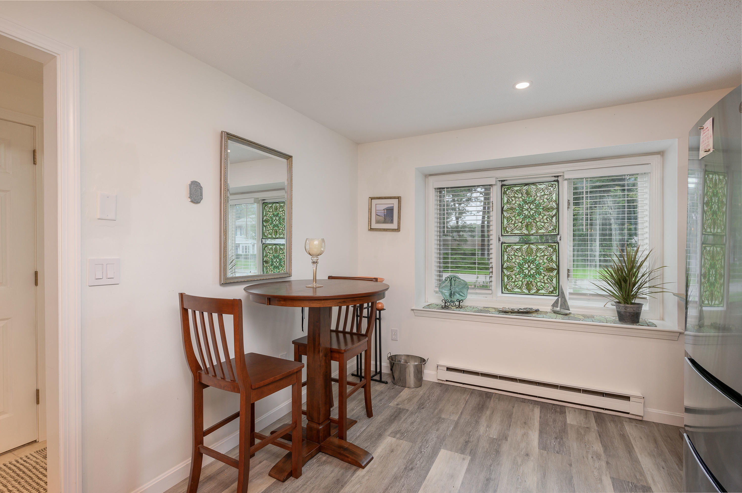 174 Lowell Road, Unit D39 Mashpee, MA 02649 - Photo 11 of 32 a dining room with furniture and window