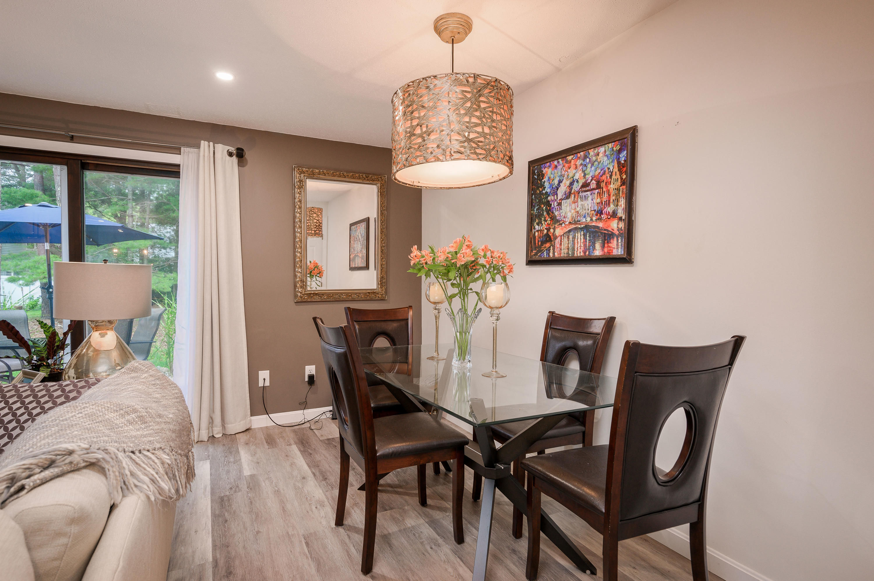 174 Lowell Road, Unit D39 Mashpee, MA 02649 - Photo 12 of 32 a view of a dining room with furniture window and outside view
