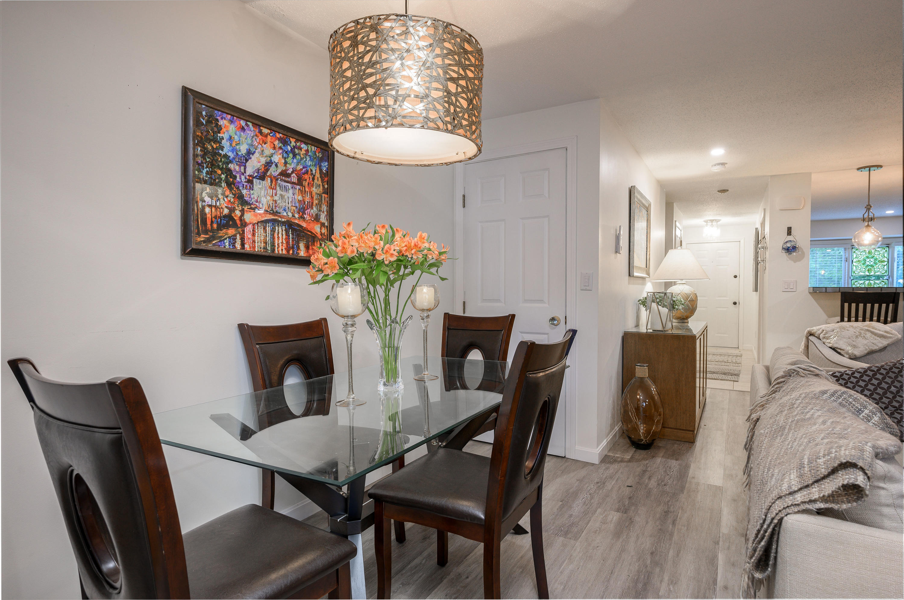 174 Lowell Road, Unit D39 Mashpee, MA 02649 - Photo 13 of 32 a dining room with furniture and wooden floor
