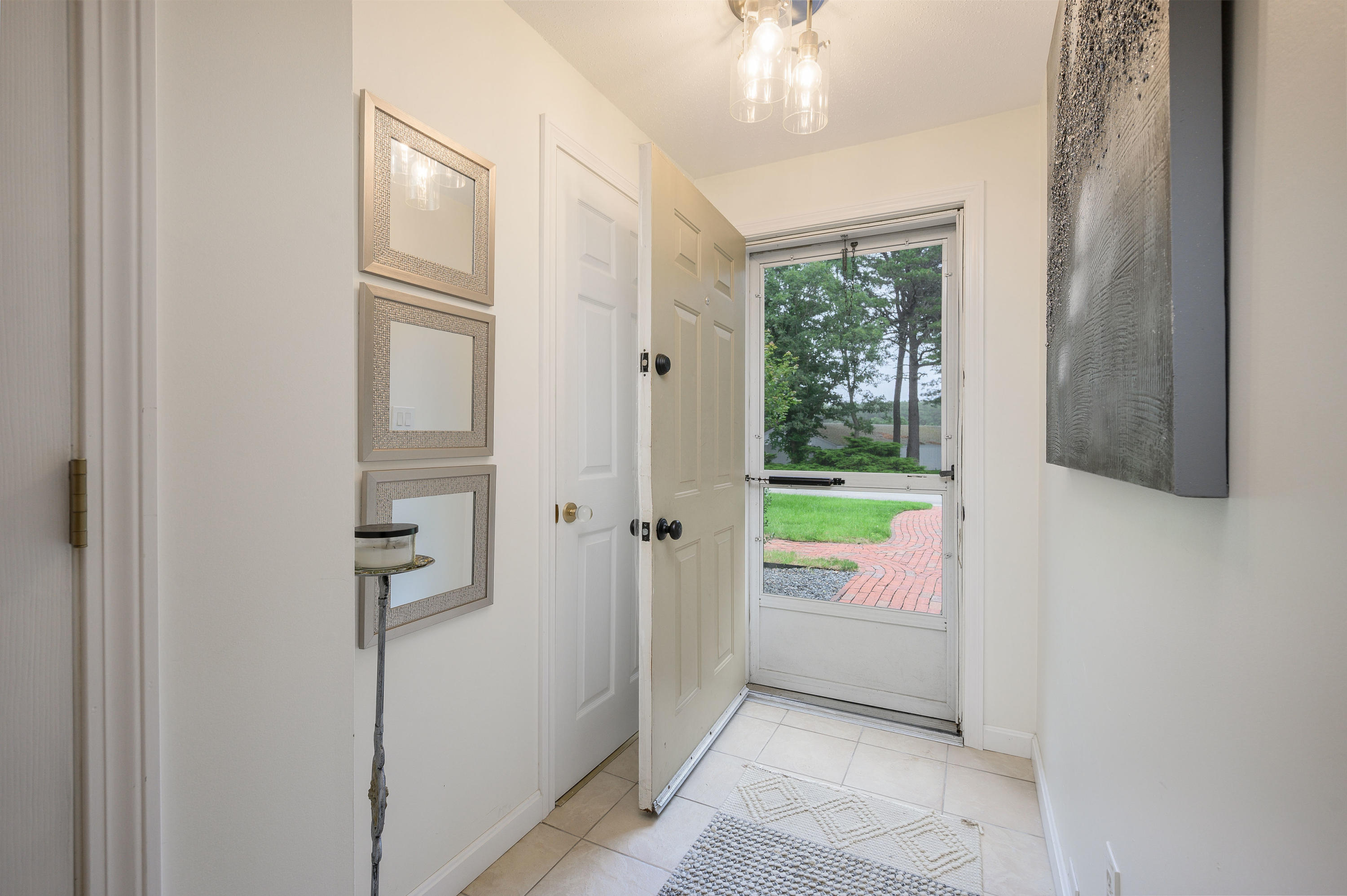 174 Lowell Road, Unit D39 Mashpee, MA 02649 - Photo 15 of 32 a view of an entryway and a livingroom