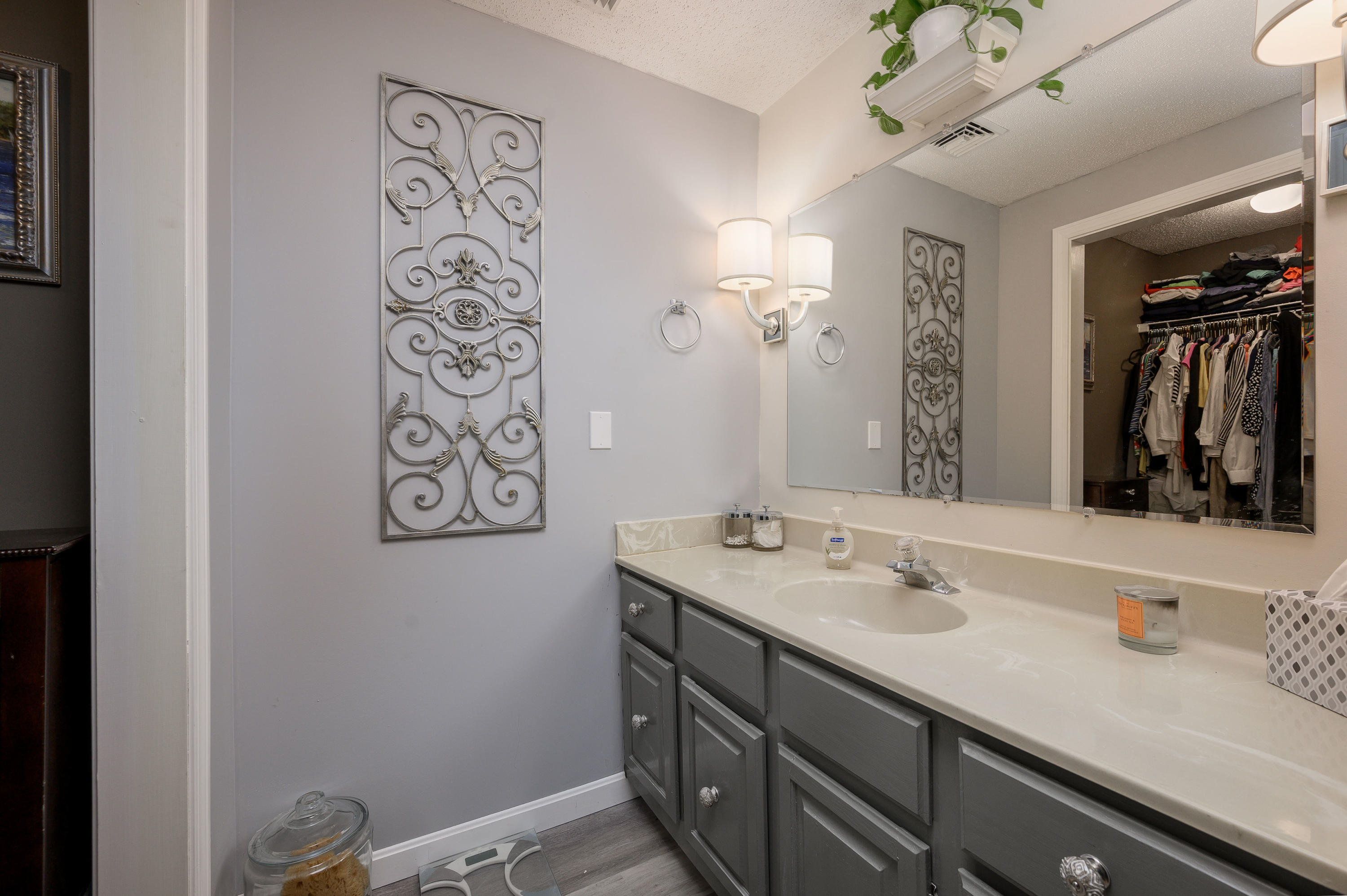174 Lowell Road, Unit D39 Mashpee, MA 02649 - Photo 20 of 32 a bathroom with a sink and a mirror