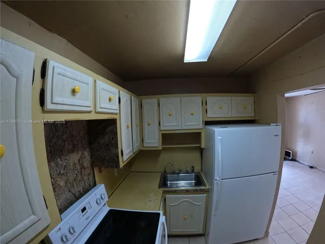 a car parked in front of a building