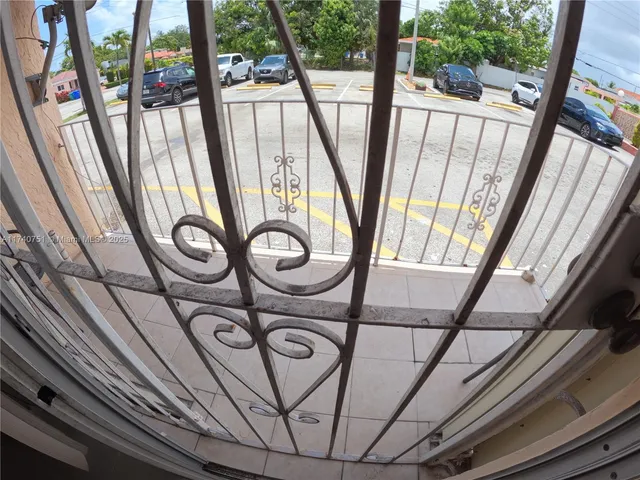 a view of hallway with shower