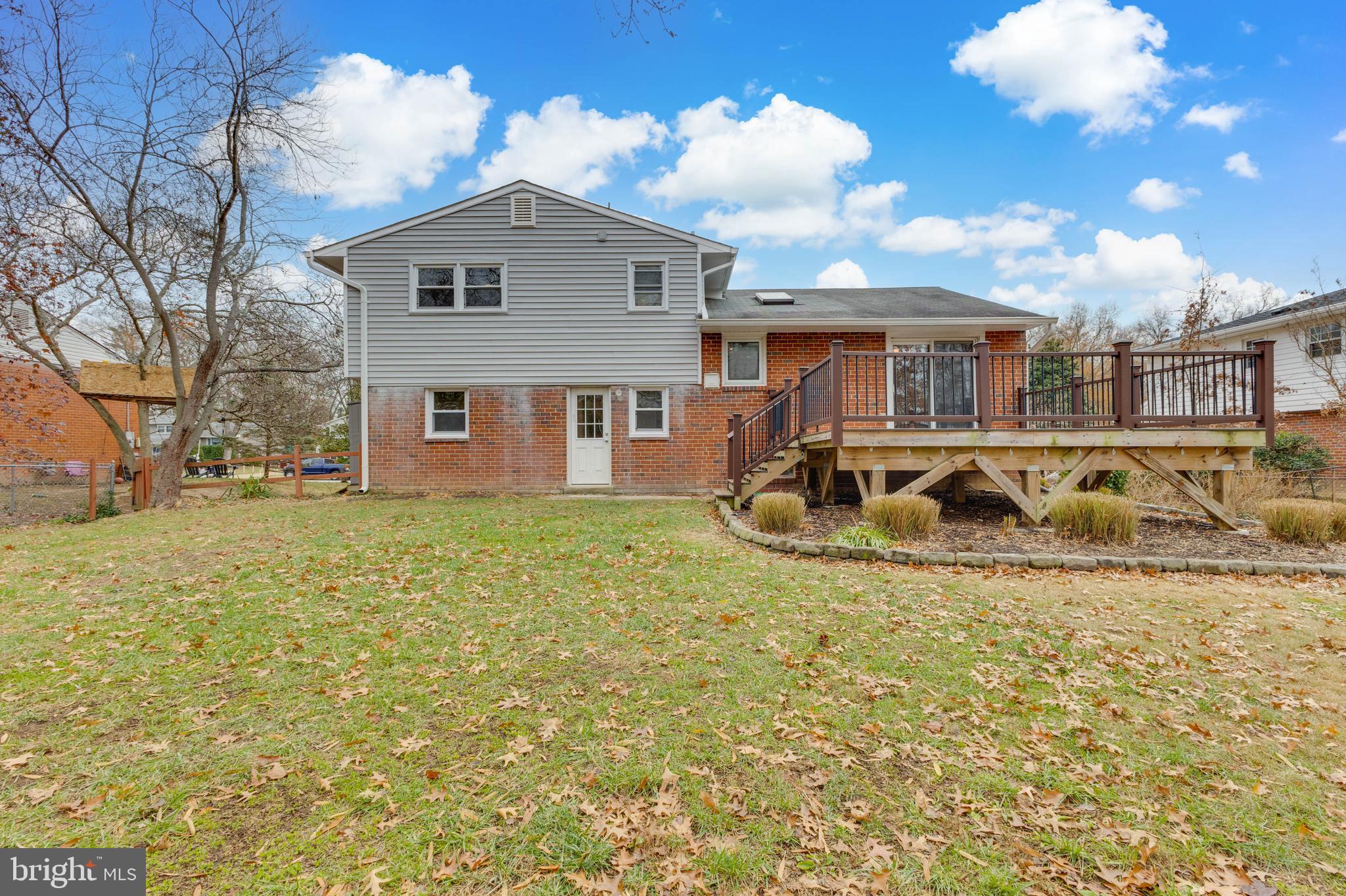 8816 Battery Road Alexandria, VA 22308 - Photo 25 of 25 a front view of a house with a yard