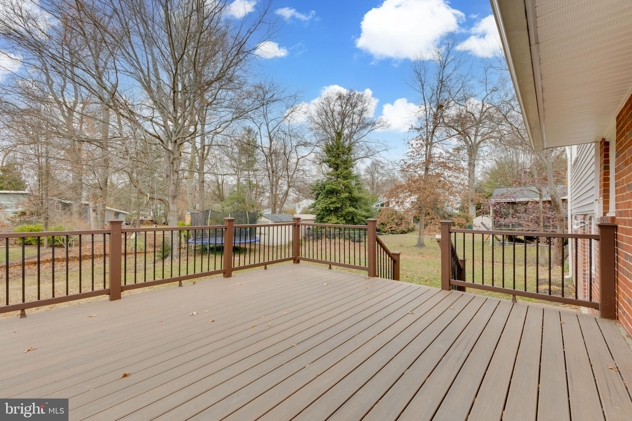 8816 Battery Road Alexandria, VA 22308 - Photo 8 of 25 a view of a balcony with wooden floor