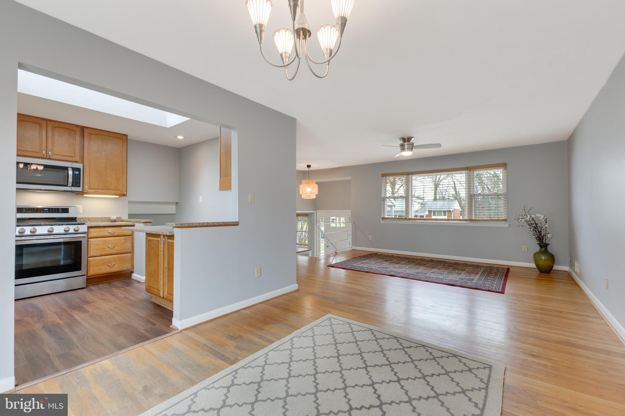 8816 Battery Road Alexandria, VA 22308 - Photo 10 of 25 a view of kitchen with sink and wooden floor