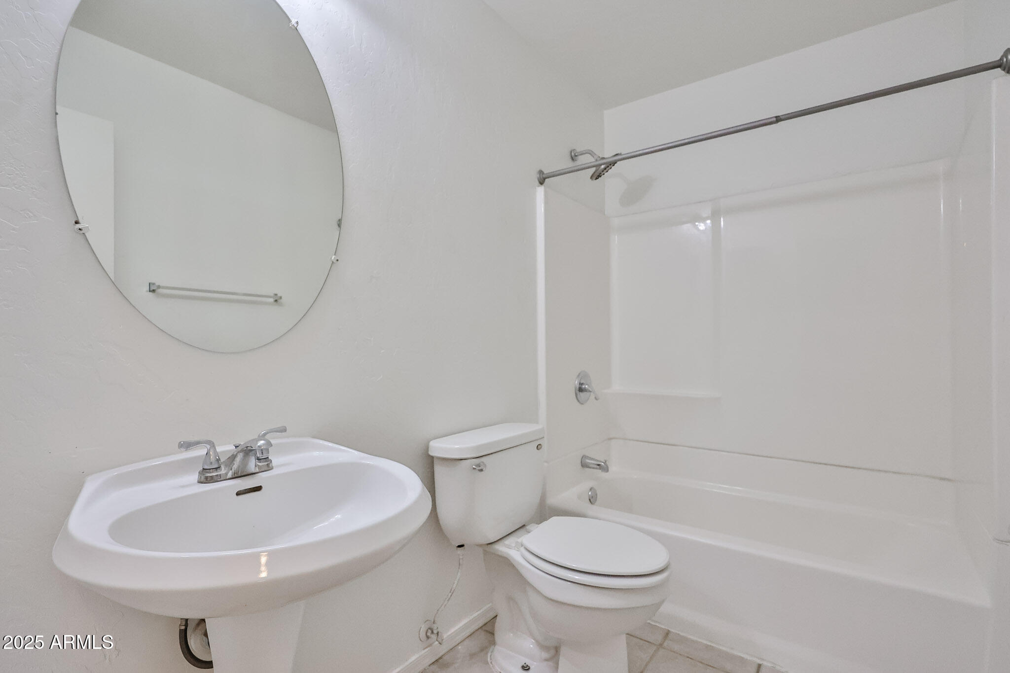 7681 West Lamar Road Glendale, AZ 85303 - Photo 17 of 36 a bathroom with a sink a toilet and shower