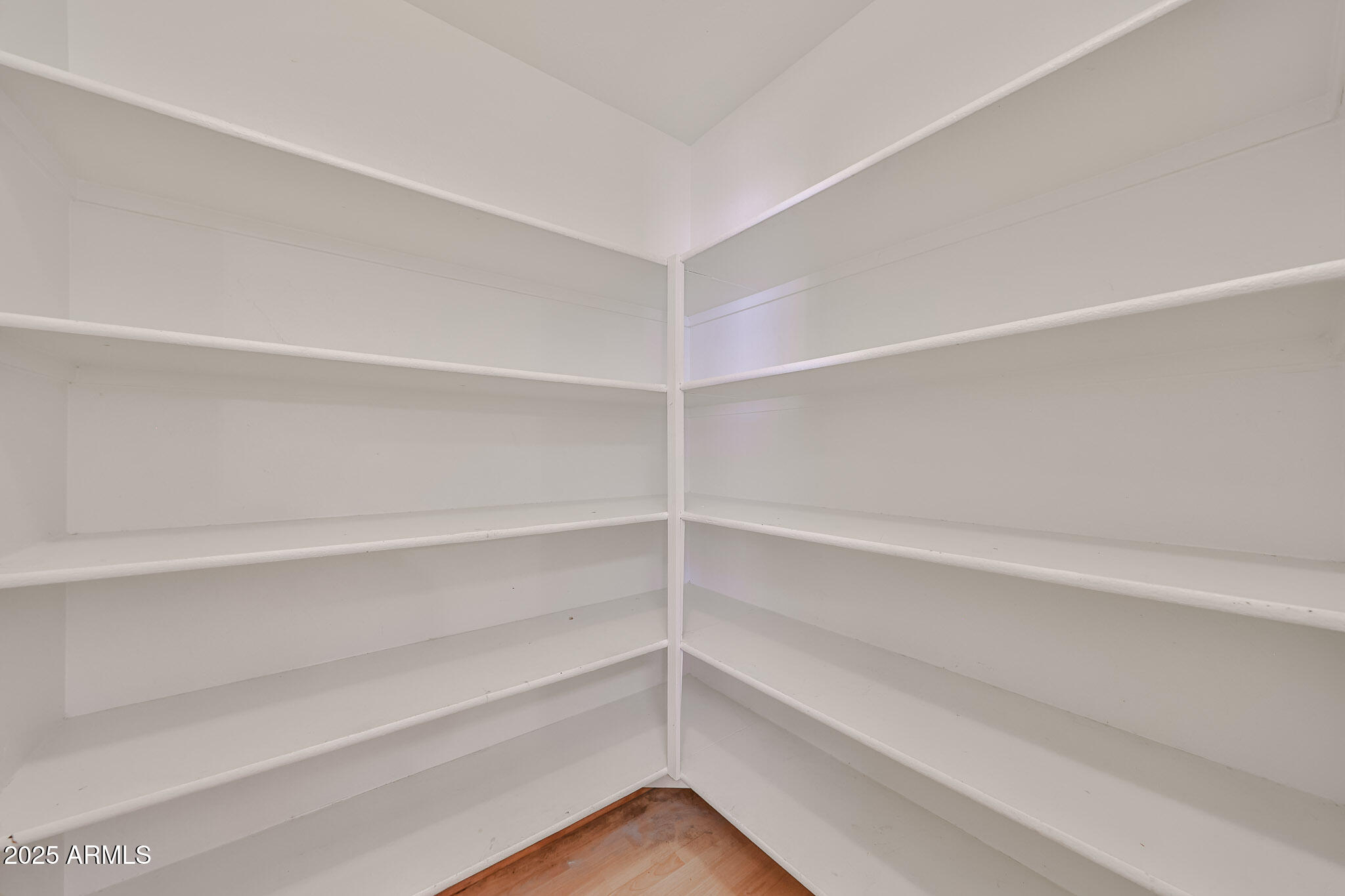 7681 West Lamar Road Glendale, AZ 85303 - Photo 21 of 36 a view of an empty walk in closet
