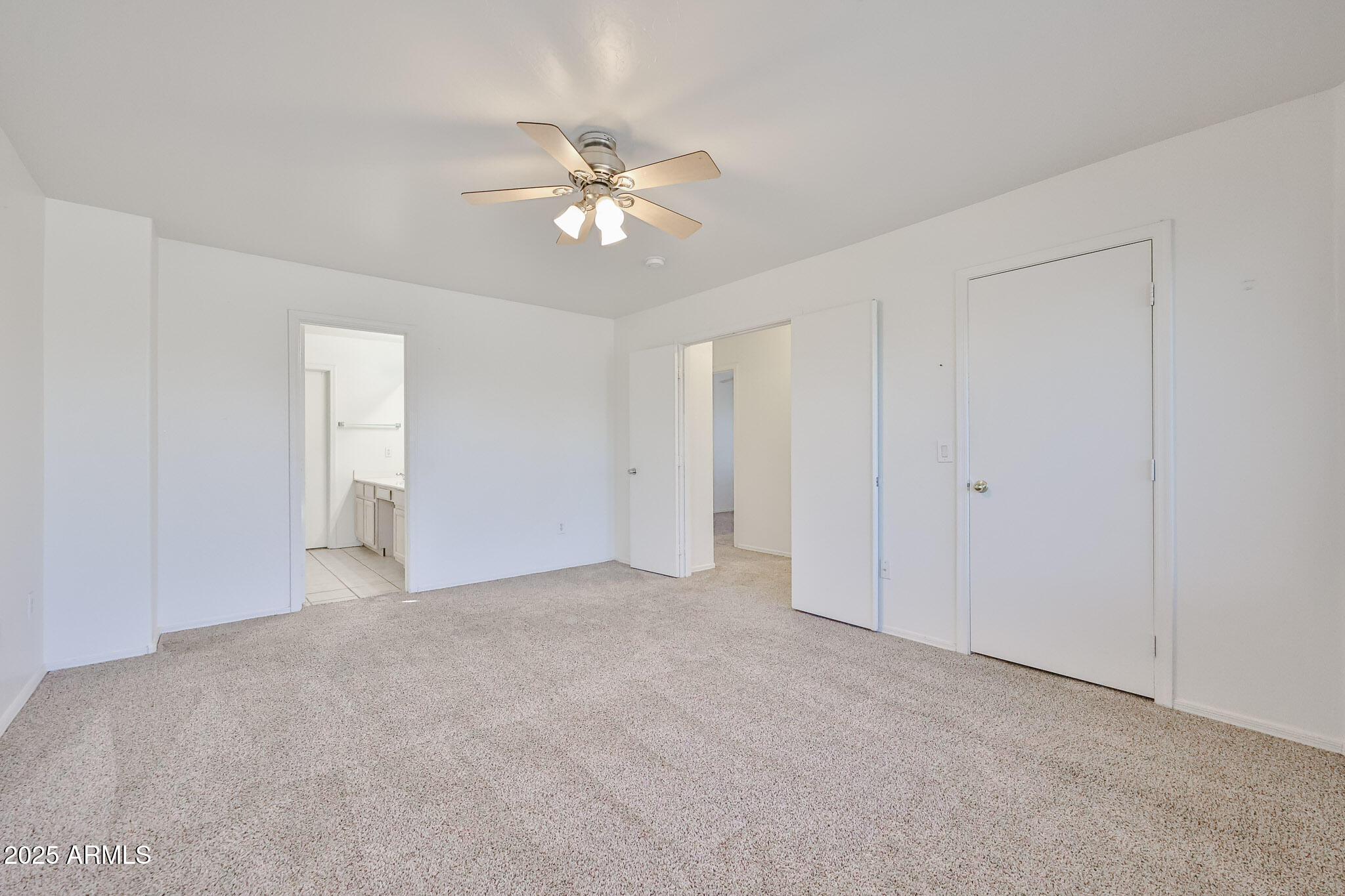 7681 West Lamar Road Glendale, AZ 85303 - Photo 28 of 36 a view of an empty room with a fan
