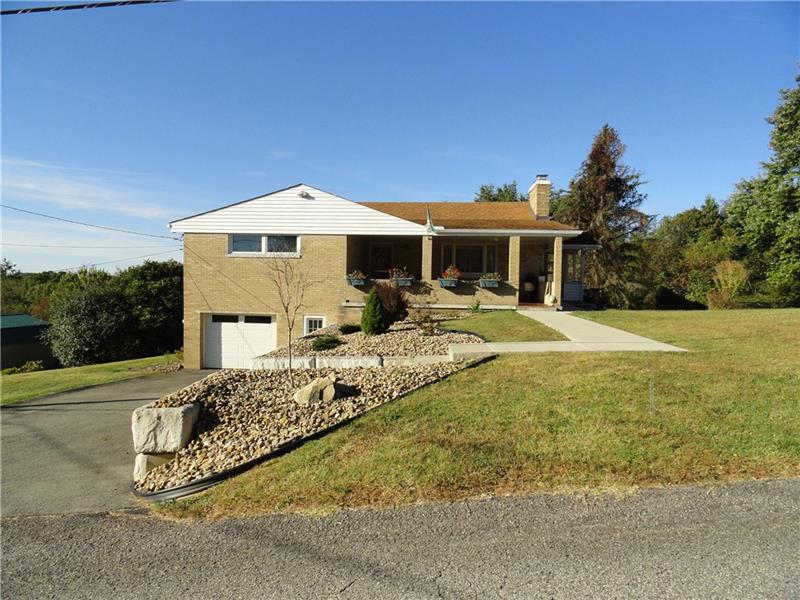 Built by handpicked craftsmen, this one family brick ranch offers lots of quality