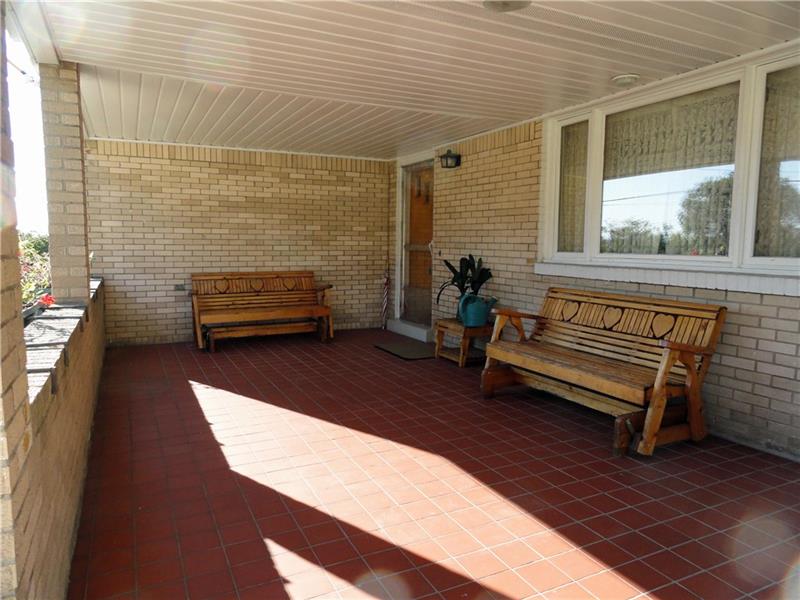 Awesome 12 x 23 tiled front porch with a great view