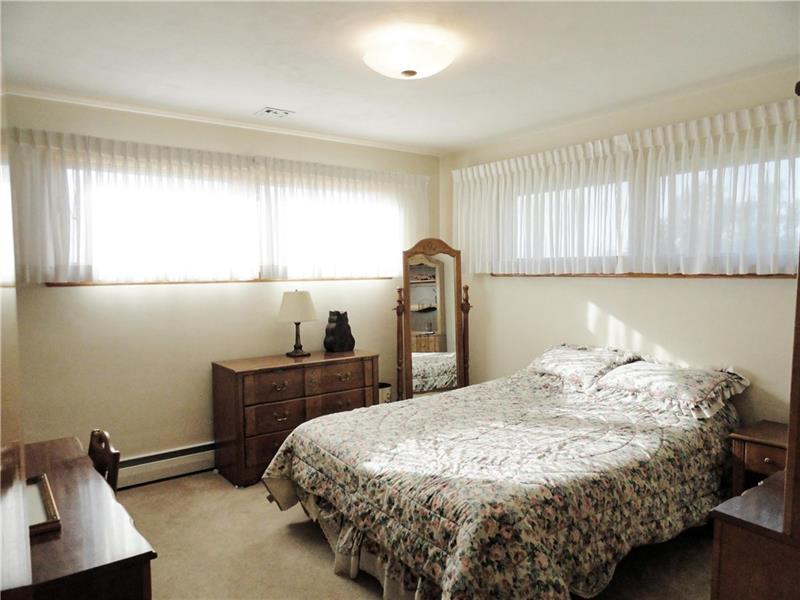 938 Peairs Road Elizabeth, PA 15037 - Photo 11 of 25 The 12 x 12 third bedroom includes large windows and lighted closets in all bedrooms