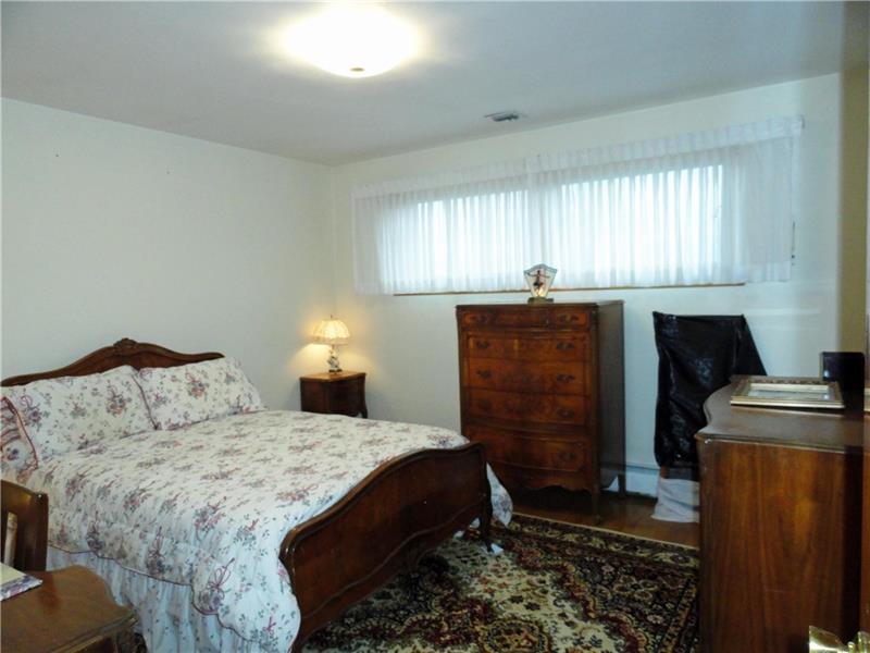 938 Peairs Road Elizabeth, PA 15037 - Photo 10 of 25 Exposed hardwood floors in the 2nd bedroom