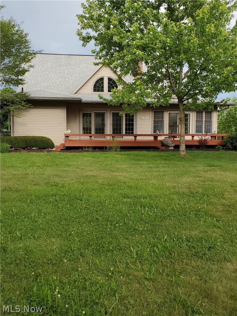 8507 Crum Road Southeast Sherrodsville, OH 44675 - Photo 23 of 30 View of back deck and french doors from great room and sun room.