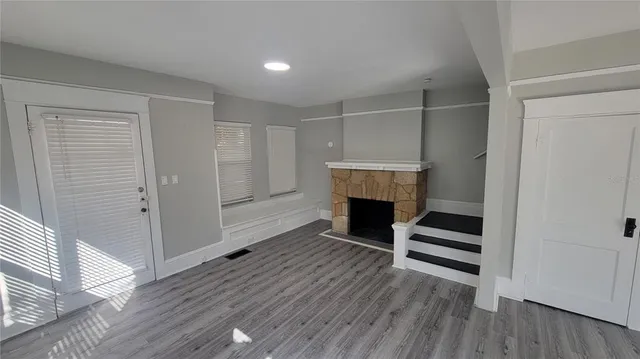 a view of kitchen and wooden floor